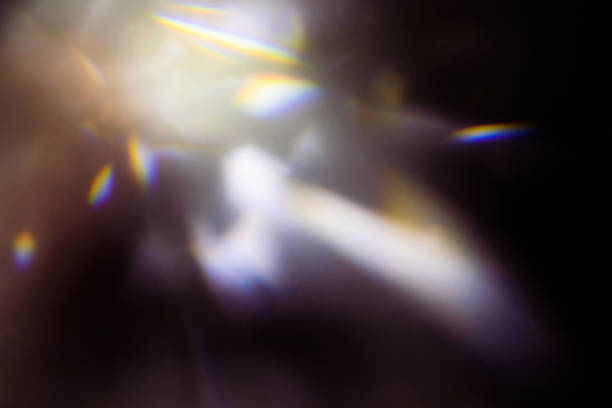 istock colorful warm rainbow light leaks on black background with dust texture 1307332025