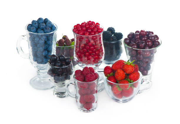 different summer berries red currant, gooseberry, raspberry in glass trays. sorted by type. superfoods from the garden - berry fruit currant variation gooseberry imagens e fotografias de stock