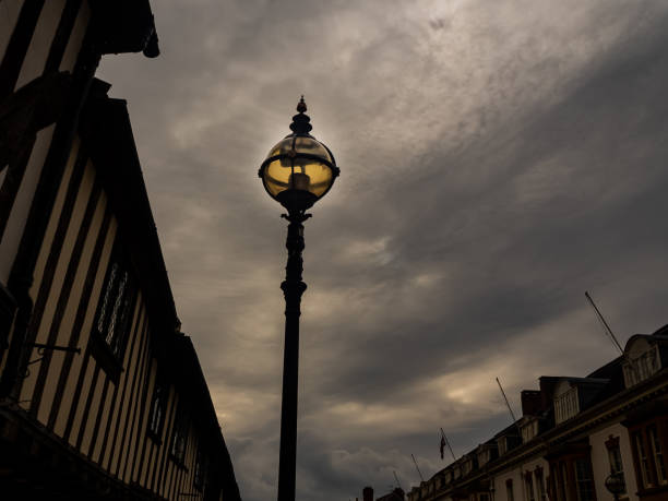 istock old street lamp with cloudy sky 1307339325
