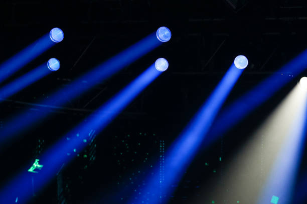 istock Blue light spotlights on the concert stage 1307339390