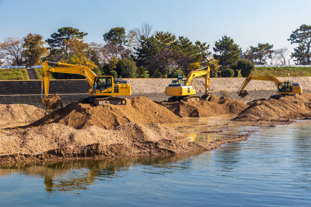 istock Hydraulic excavators working in the river 1307340655