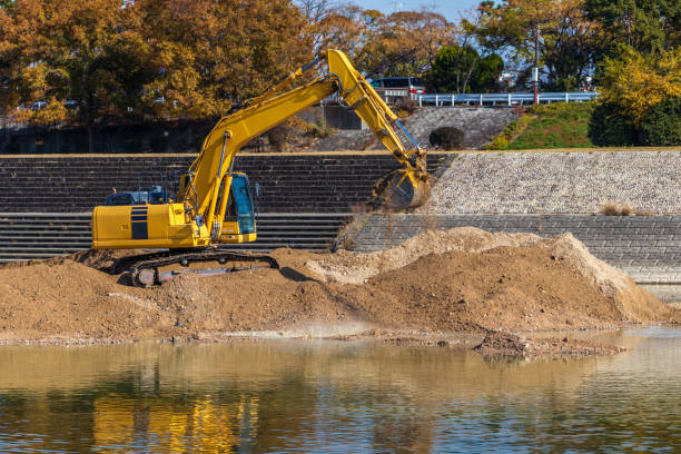 istock Hydraulic excavator for dredging work in the river 1307341275