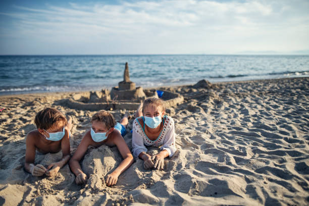 istock Kids enjoying beach vacations during COVID-19 1307341457