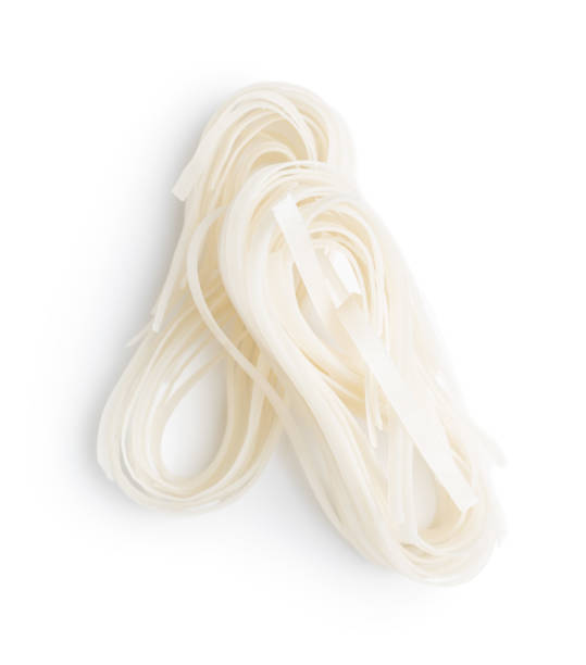 istock Dried white rice noodles. Raw pasta. Uncooked noodles. 1307343992