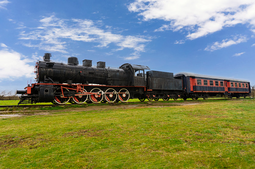 old steam train with blue sky