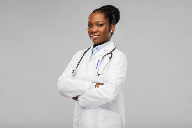 istock african american female doctor with stethoscope 1307345205