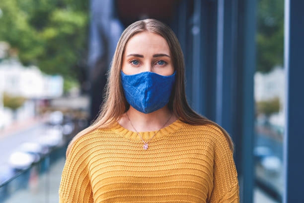 istock Behind every mask there is a face, and behind that a story 1307349852