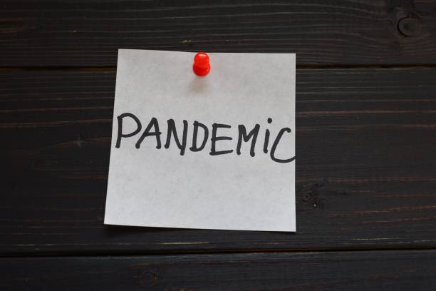 istock Inscription pandemic on sticker 1307350832