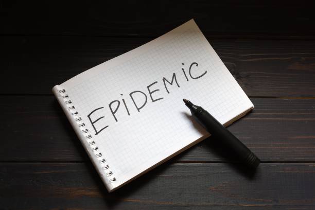 istock The inscription epidemic on the notepad writes hand 1307350833