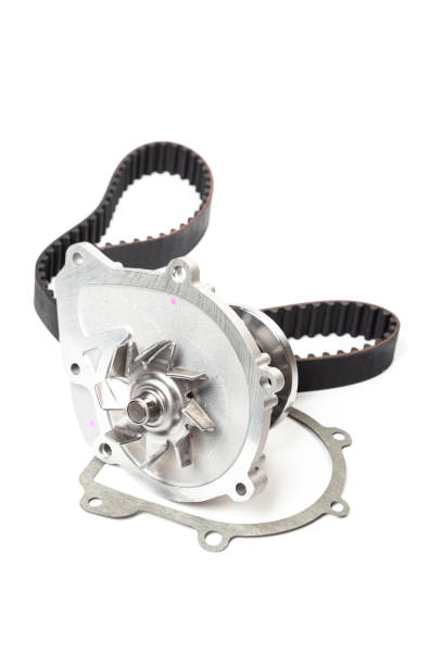 istock automatic water pump for car and belt isolated on white background. Automobile spare part 1307352848