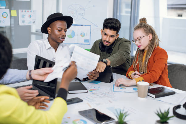 istock Multiracial people sharing creative ideas during meeting 1307356371