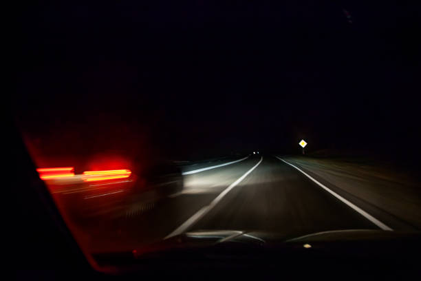 istock Night photo from the car window. 1307356625