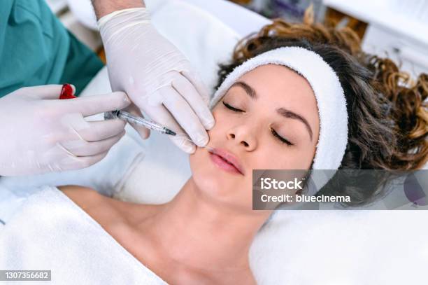 Beauty Treatment With Botox Stock Photo - Download Image Now - Dermal Filler, Human Lips, Botulinum Toxin Injection