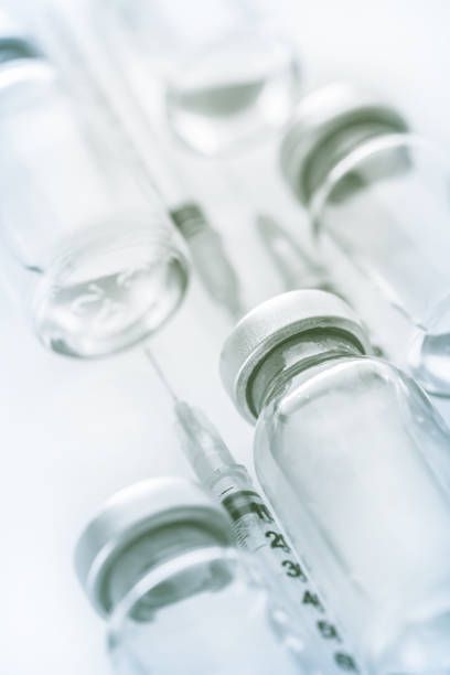 istock syringe and medicine bottle for injection 1307362021