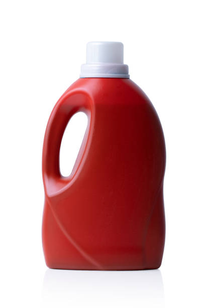 istock Red plastic bottle with a white screw cap on white backgrpund 1307362573