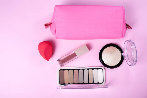 istock set of decorative make up cosmetics on rose background with copy space 1307364302