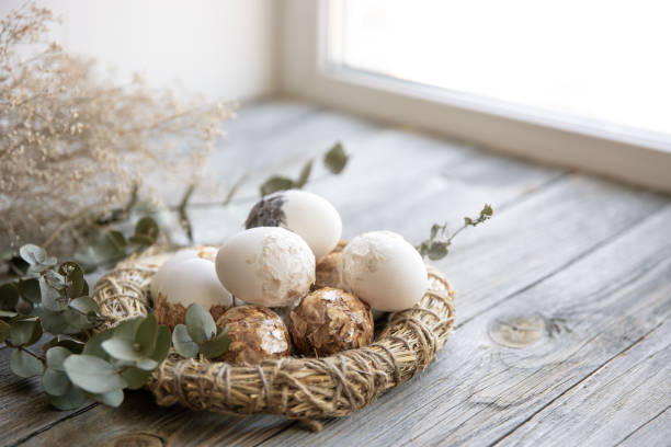 istock Easter composition with festive eggs in a decorative nest close up. 1307365285