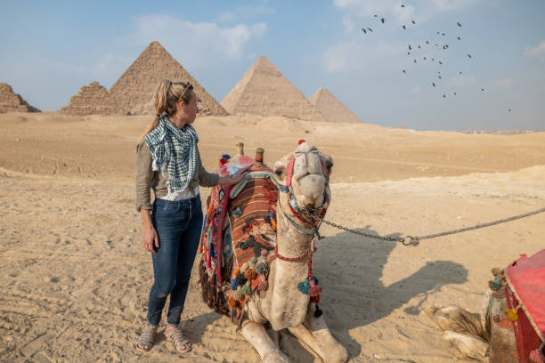 istock Woman sightseeing in Egypt, pyramids 1307365994