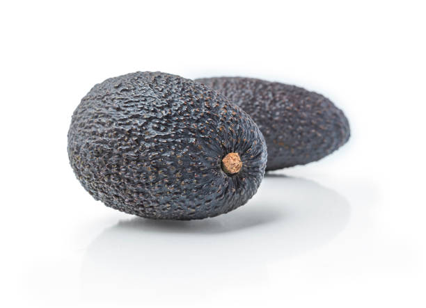 istock Avocado isolated on white background. Two Avocadoes close up 1307366111