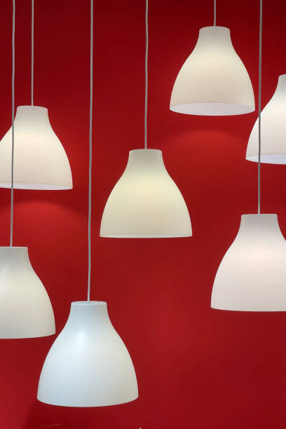 istock Design decoration lamp against red wall for interior design showcase. 1307368591