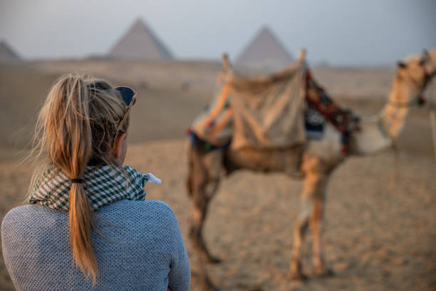 istock Woman sightseeing in Egypt, pyramids 1307368764