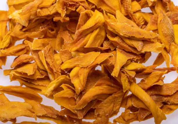 istock Pile of Dried Mango Slices 1307369408