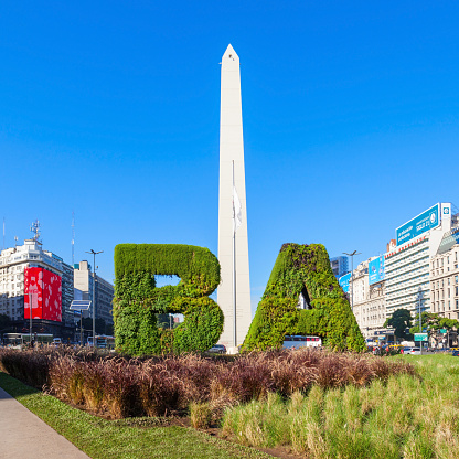 BUENOS AIRES, ARGENTINA - APRIL 14, 2016: Buenos Aires sign and Obelisco in Buenos Aires in Argentina. The Obelisk of Buenos Aires is a national historic monument and icon of Buenos Aires.