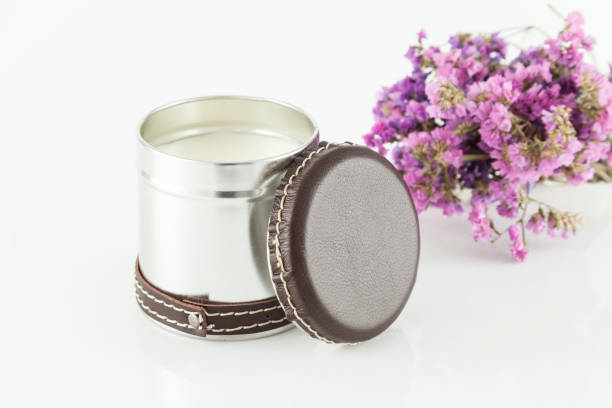 istock Multipurpose metal container decorated with leather. Used as a candle; photo on white background. 1307373325