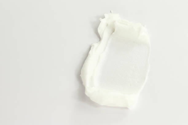 White face body hand legs cream smashed on white, cosmetic texture, skin care, facial treatment cosmetics makeup swipes stock pictures, royalty-free photos & images