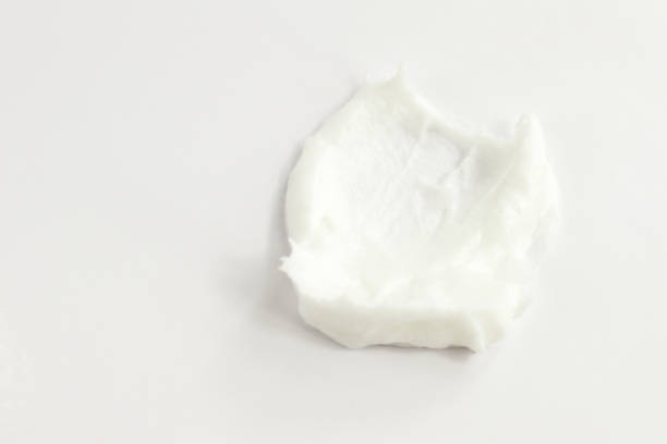 istock White face body hand legs cream smashed on white, 1307374084