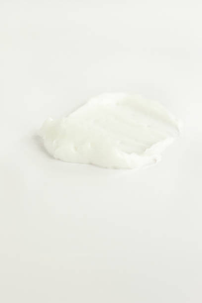 White face body hand legs cream smashed on white, cosmetic texture, skin care, facial treatment cosmetics makeup swipes stock pictures, royalty-free photos & images