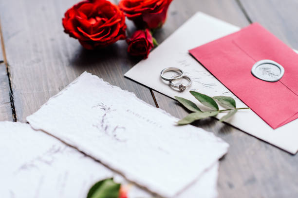 istock wedding rings on a wooden background 1307377484