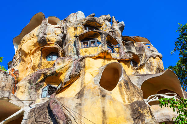 Russian guesthouse cave in Dalat DALAT, VIETNAM - MARCH 12, 2018: Hang Nga guesthouse or Crazy House is an unconventional fairy tale building in Dalat in Vietnam central highlands vietnam photos stock pictures, royalty-free photos & images