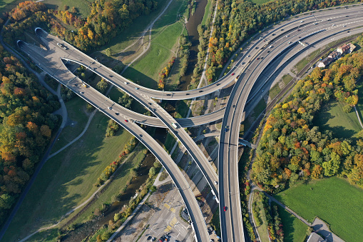 Zurich highway with several lines. some elevated. The high angle image was captured during autumn season near Zurich City.