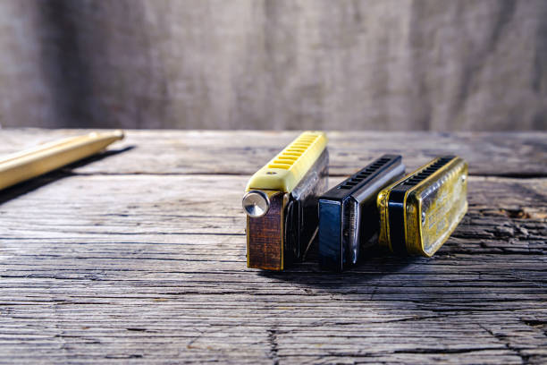 istock musical instruments vintage harmonics diatonic and chromatic and drum sticks 1307384410