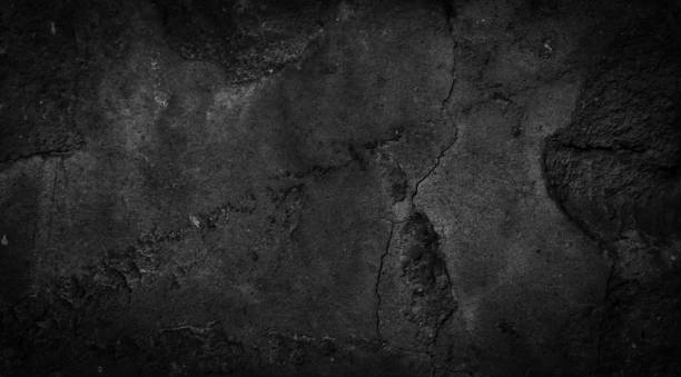istock macro photo of black brick with visible texture. background 1307386691