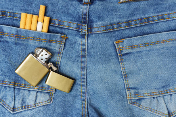 istock cigarettes in the back and lighter pocket of jeans 1307391355