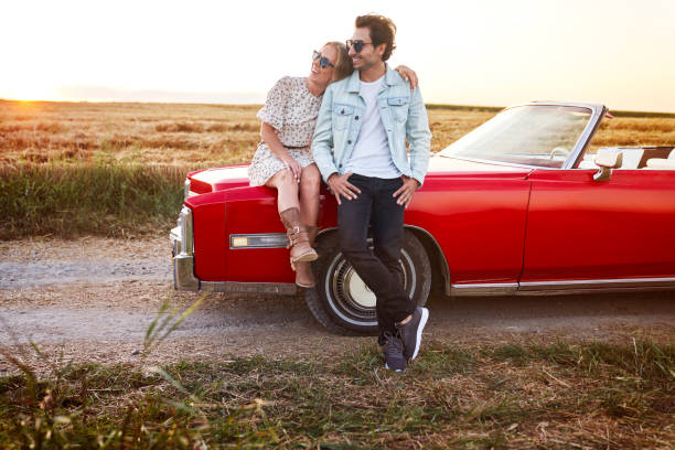 istock Couple on a date by the car 1307391701