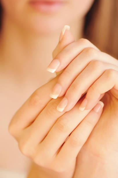 istock Care for beautiful woman hands. Focus on hands 1307394142