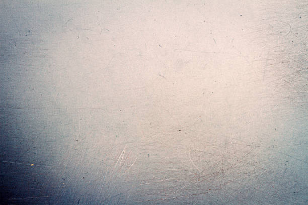 istock Abstract blue and yellow scratched film background 1307395226