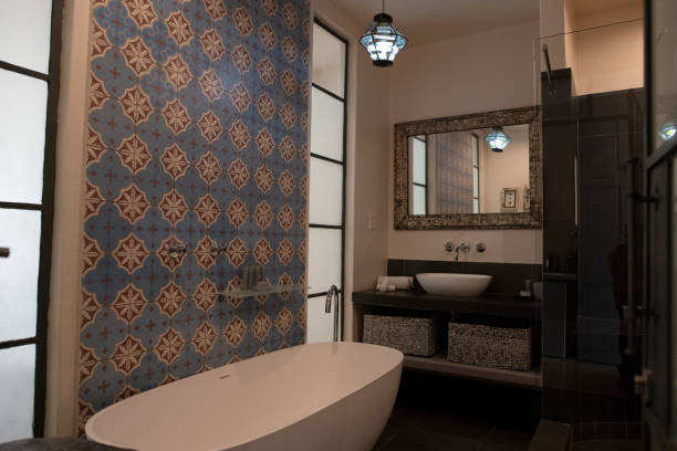 istock Bath tub in luxury home master bathroom 1307396738