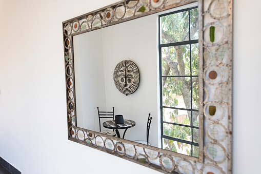 Living room mirror with textured frame