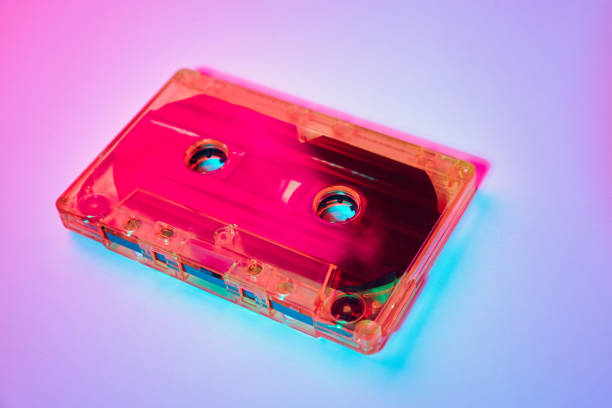 istock Retro cassette tape on a colorful neon background 1307396875