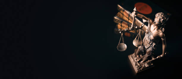 istock Lady justice. Statue of Justice in library 1307397226