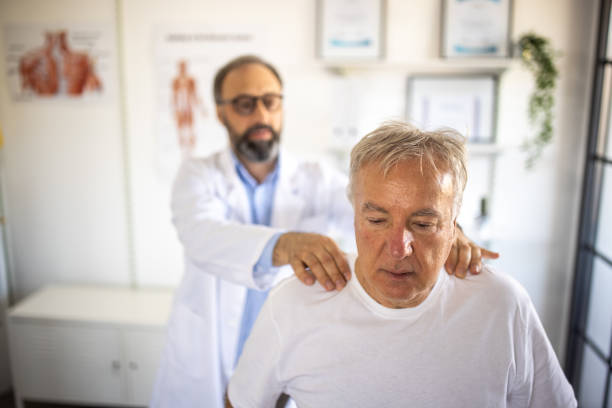 istock Patient in a visit at physical therapist's office 1307399037