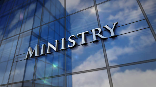istock Ministry glass skyscraper with mirrored sky 3d illustration 1307399773