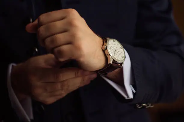Photo of The man wears watches