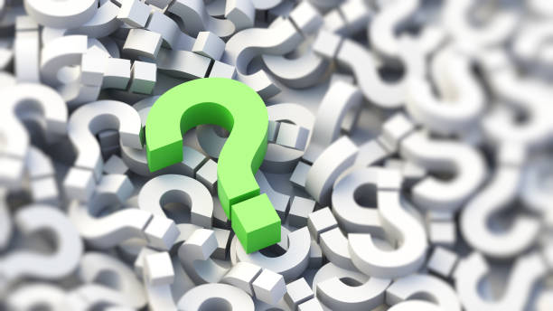 istock Green question mark on a background of white signs, FAQ Concept 1307400103