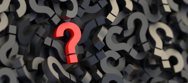 istock Red question mark on a background of black signs, FAQ Concept 1307400115