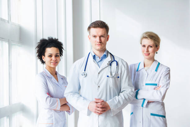 istock Doctor and his medical team 1307400116